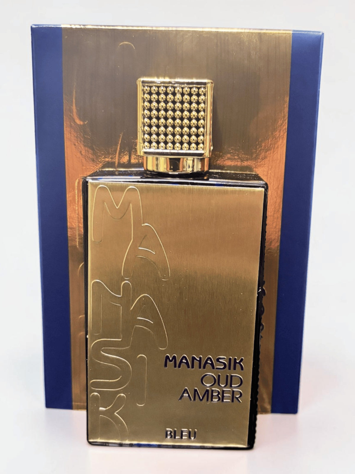 Flacon de parfum ParfumShop38 Manasik Oud Amber Bleu avec finition dorée luxueuse et détails bleu profond